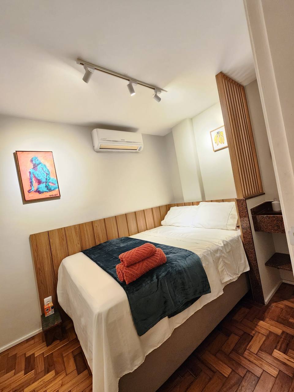 Primary bedroom with queen bed and A/C