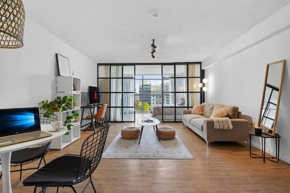 Spacious studio with living, dining, and integrated bedroom
