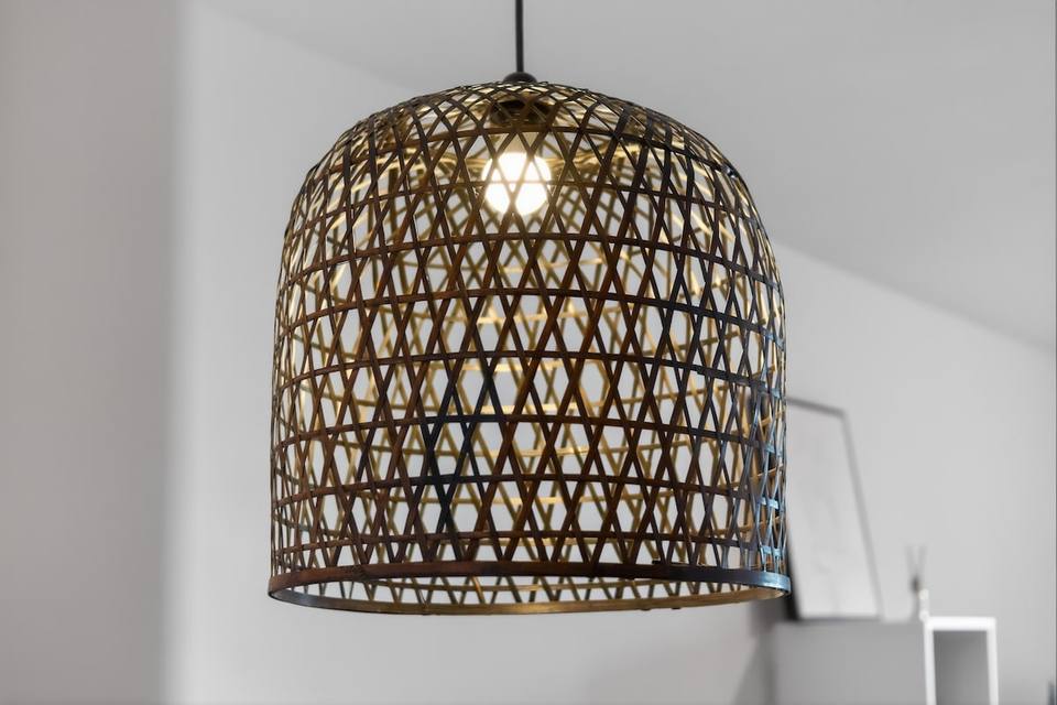 Hanging rattan ceiling lamp with warm light