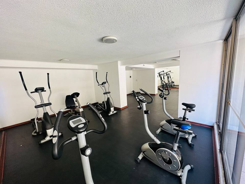 Gimnasio del edificio a disposición