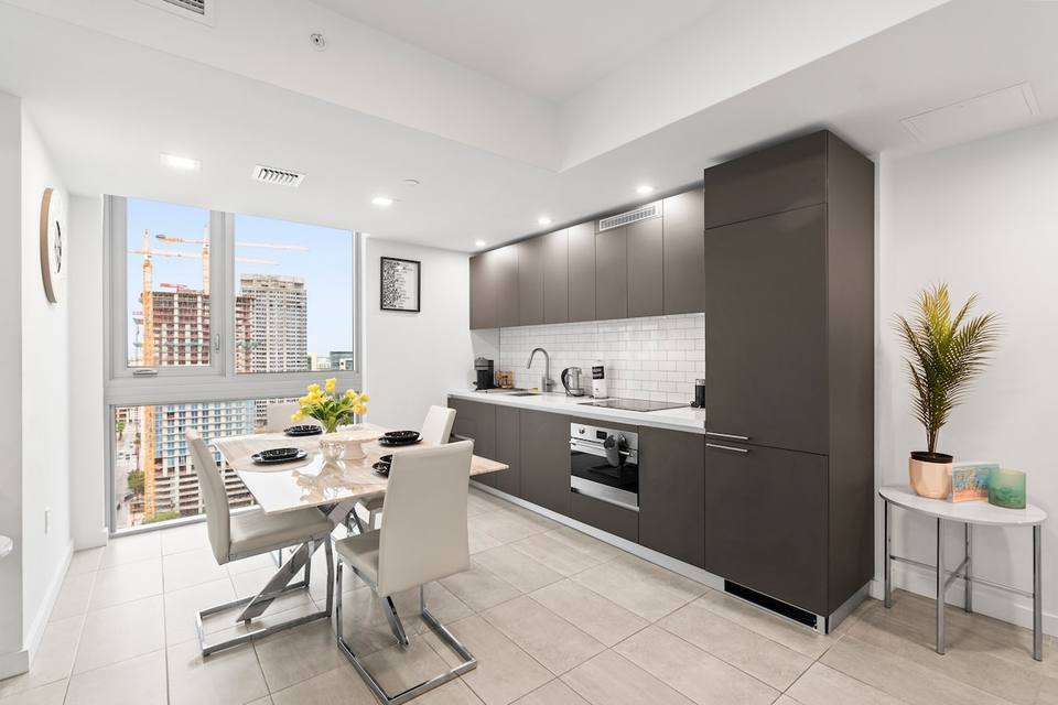 Integrated kitchen with stainless steel appliances
