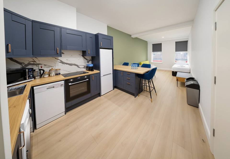 Spacious open-concept space with modern kitchen and living area