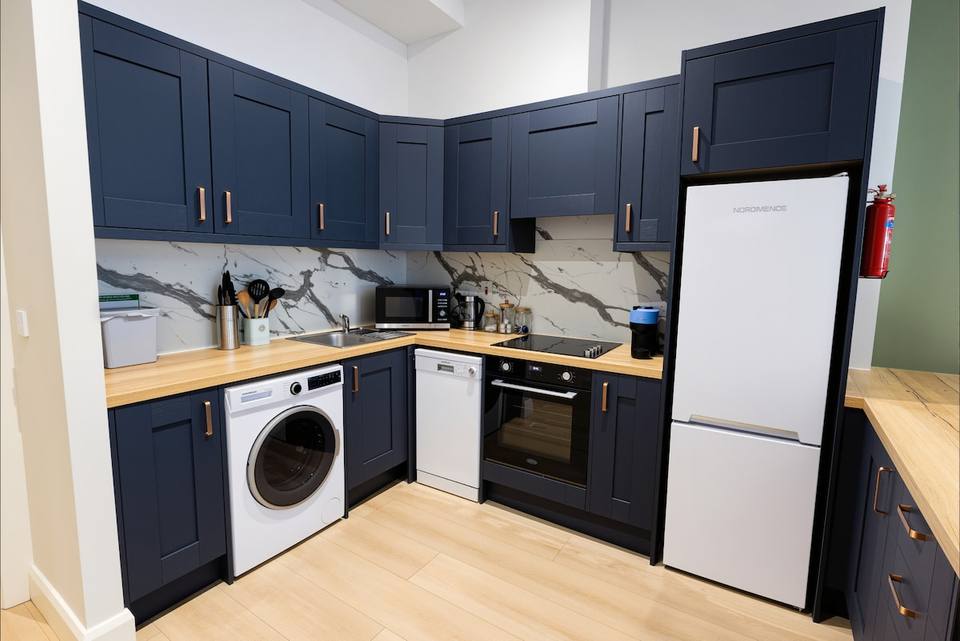 Fully equipped kitchen with stainless steel appliances