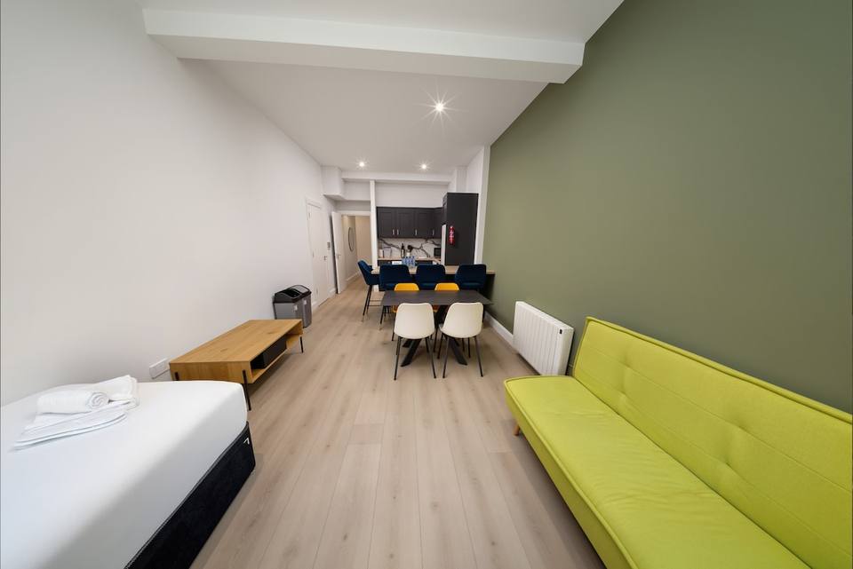 Spacious, bright primary bedroom with versatile setup