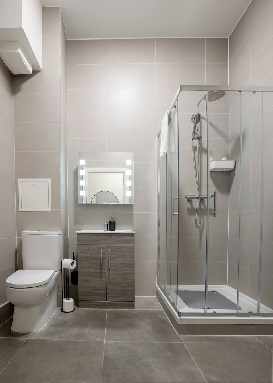 Bathroom detail with backlit mirror