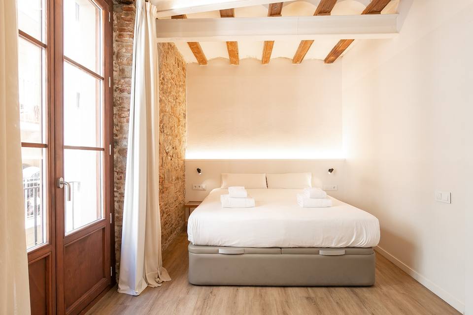 Serene primary bedroom with queen bed