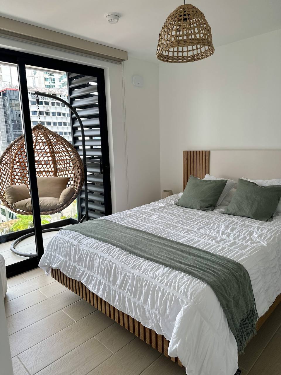 Master bedroom with queen bed and contemporary design