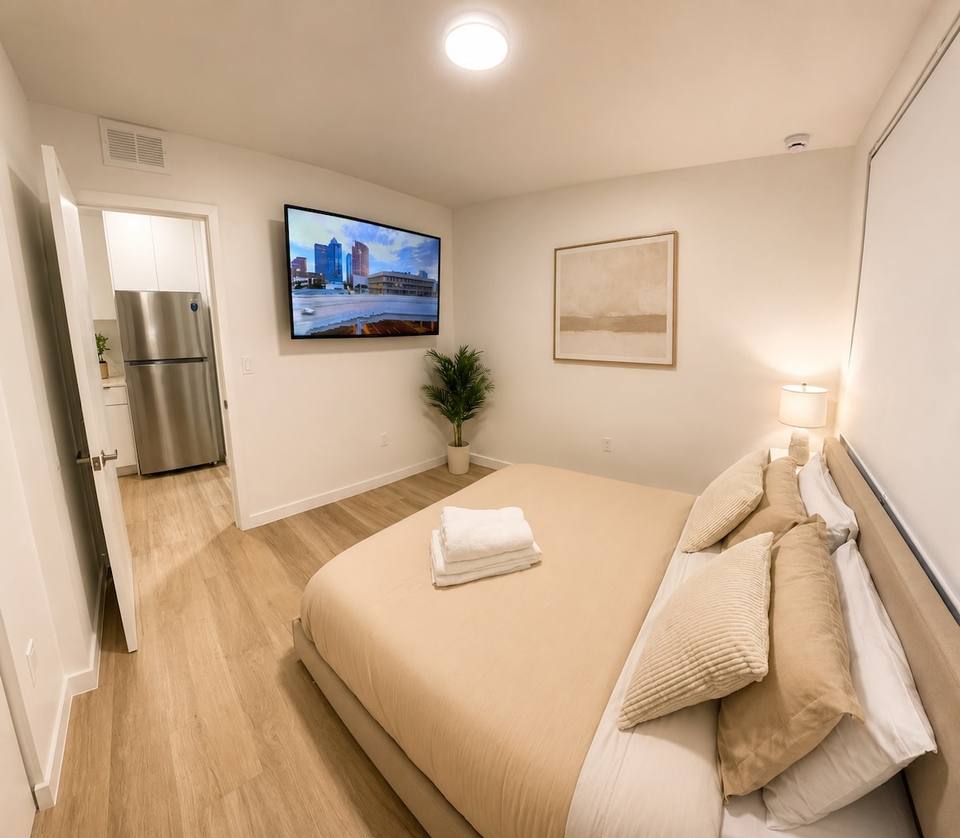 Dormitorio principal con cama Queen