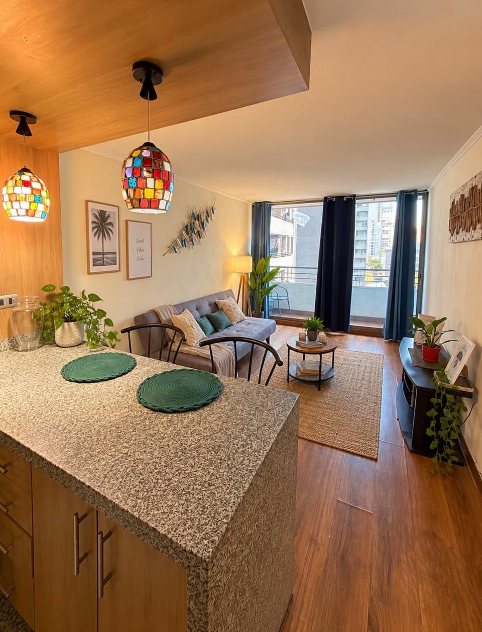 Spacious, bright living room with balcony access